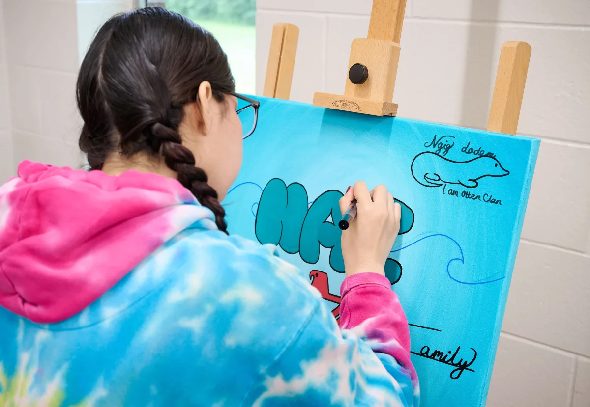 A student making an art piece.