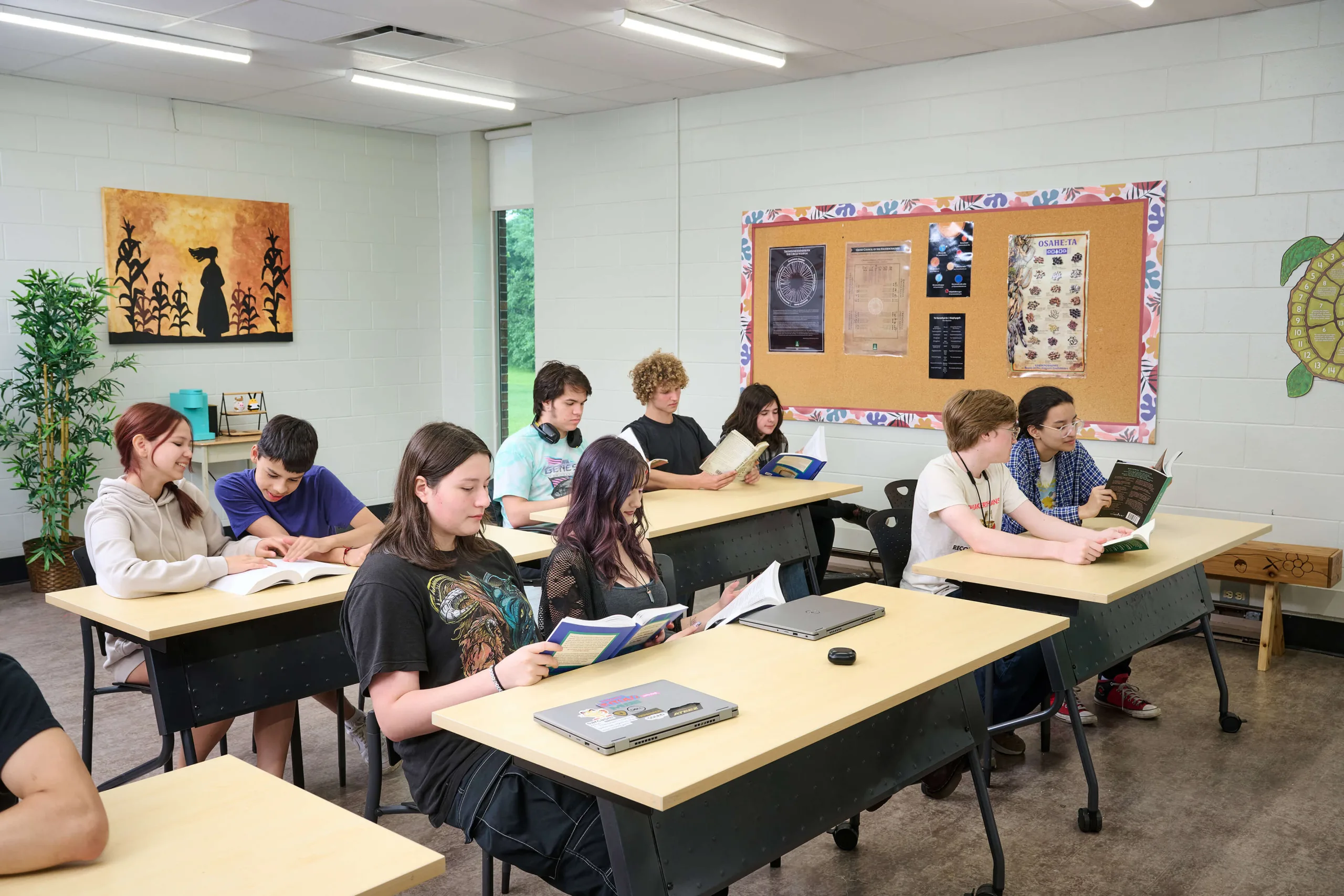 Students in a classroom, having a geography class.